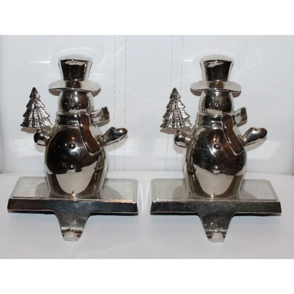 pair metal snowman stocking hangers silver tone holding Christmas tree lot of 2